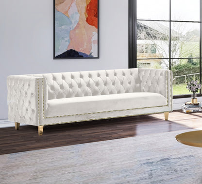 Tufted sofa with Gold Nailheads