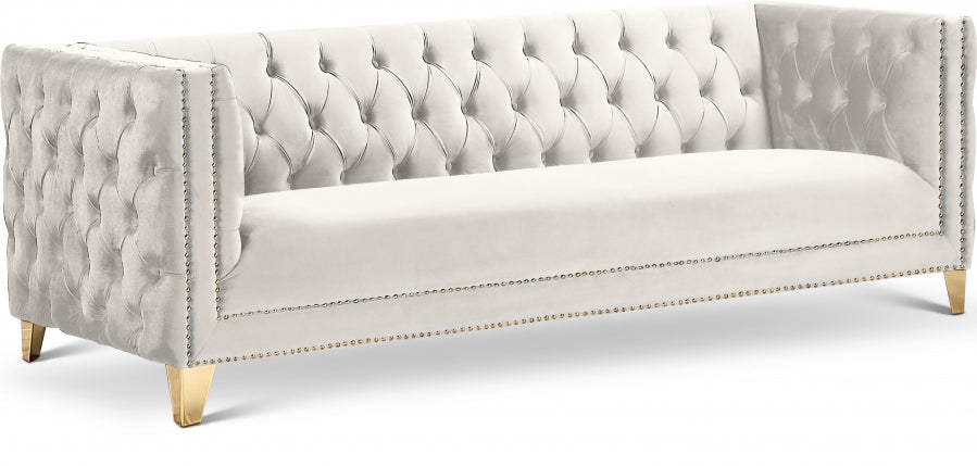 Tufted sofa with Gold Nailheads