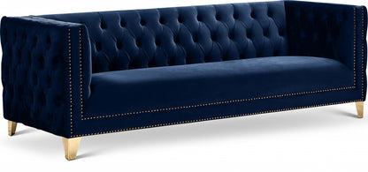 Tufted sofa with Gold Nailheads